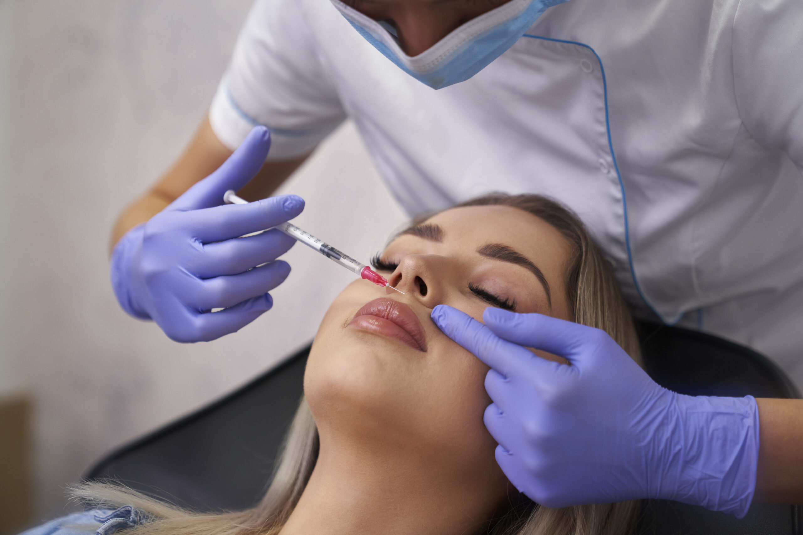Woman having beauty procedure in beauty salon